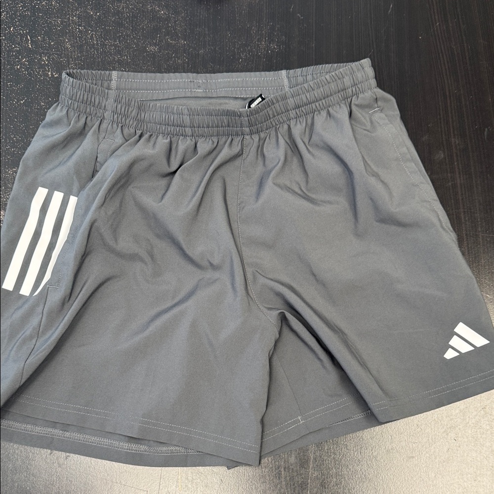 Adidas men’s Own the Run 5” running shorts. Medium. Grey
